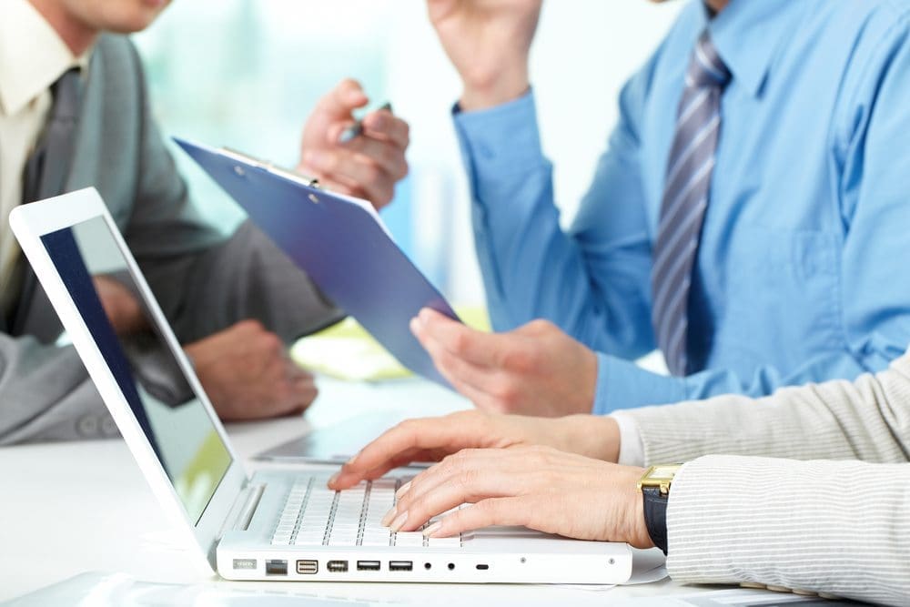 Founder reviewing a Japanese company plan on a laptop